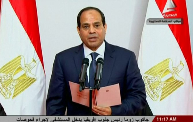 „Reuters“/„Scanpix“ nuotr./Abdel Fattahas al Sisi prisaikdintas Egipto prezidentu.