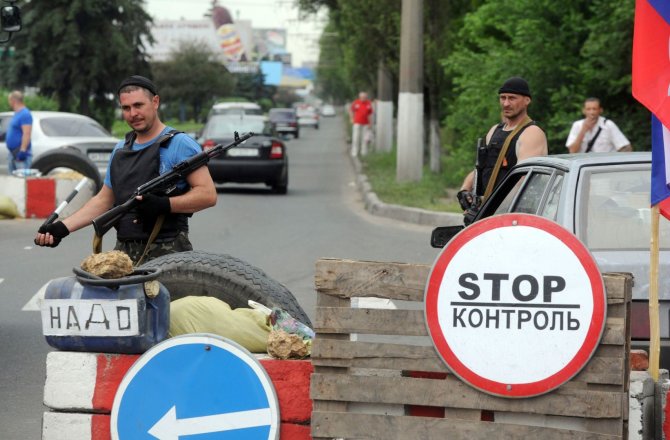 AFP/„Scanpix“ nuotr./Prorusiški separatistai Donecke