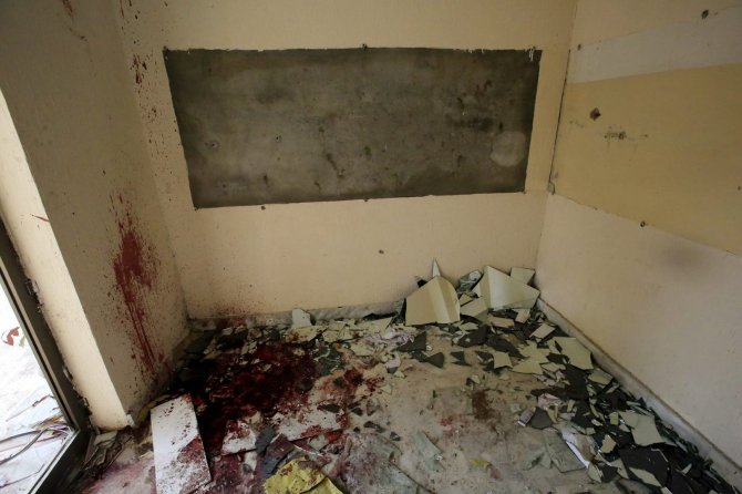 „Scanpix“/„Anadolu Ajansi“ nuotr./Pešavaro miesto mokykla po Talibano kovotojų išpuolio