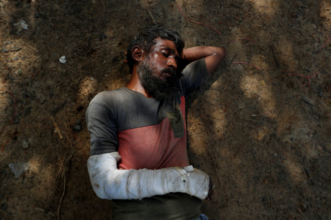„Reuters“/„Scanpix“ nuotr./Rohinjai, patyrę smurtą ir kankinimus Mianmare