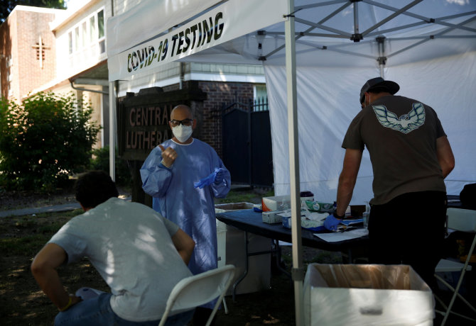 „Reuters“/„Scanpix“ nuotr./JAV siautėja koronavirusas