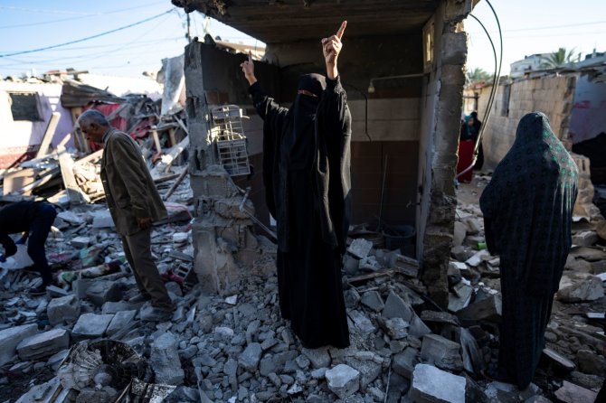 „AP“/„Scanpix“/Gazos Ruožo gyventojai griuvėsiuose