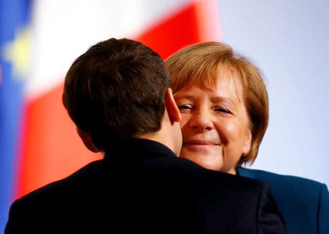 „Reuters“/„Scanpix“ nuotr./Emmanuelis Macronas ir Angela Merkel