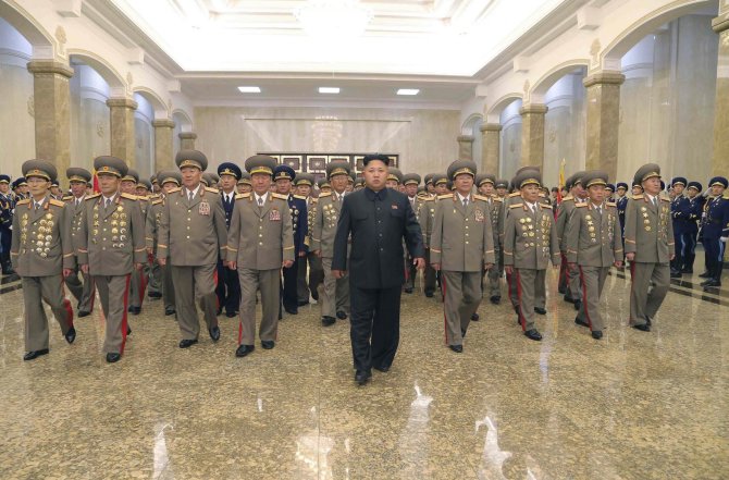 AFP/„Scanpix“ nuotr./Šiaurės Korėjos lyderis Kim Jong Unas
