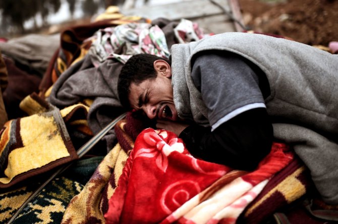 AFP/„Scanpix“ nuotr./Artimieji gedi per antskrydį žuvusių aukų