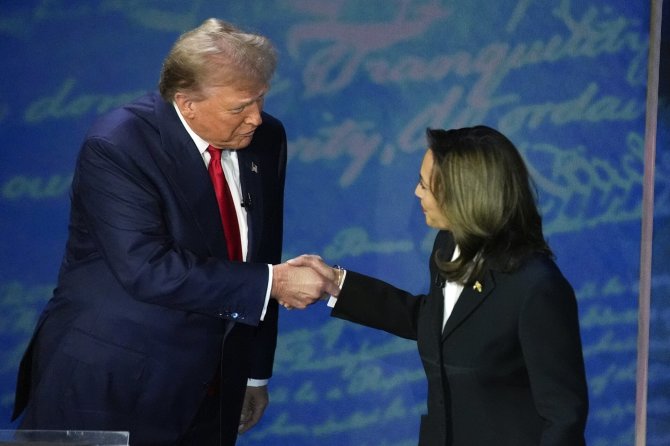 „Scanpix“/AP nuotr./Donaldas Trumpas ir Kamala Harris