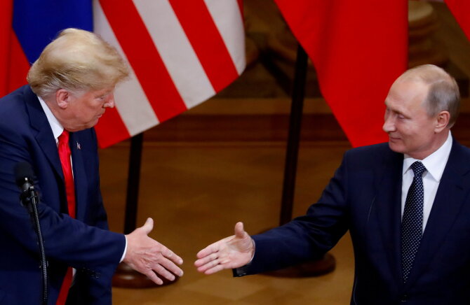 „Reuters“/„Scanpix“/Donaldas Trumpas ir Vladimiras Putinas, 2019 m.