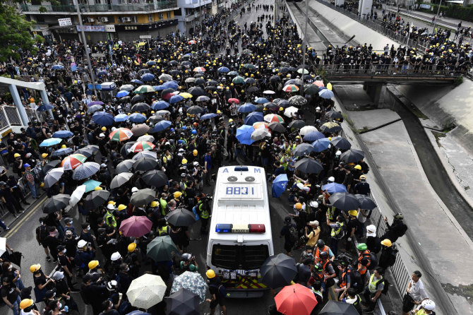 AFP/„Scanpix“ nuotr./Protestai Honkonge