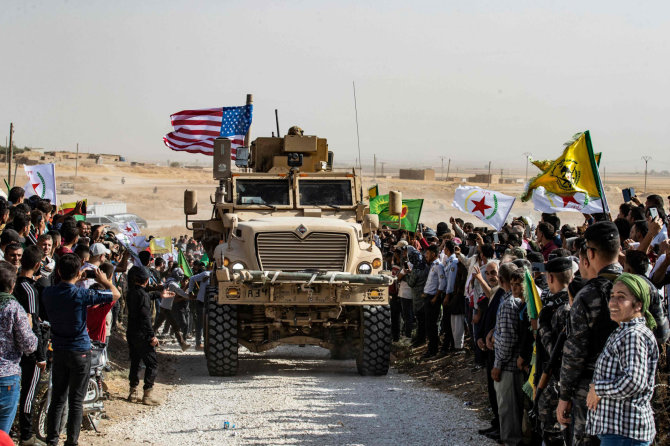 AFP/„Scanpix“ nuotr./JAV kariai per Sirijos kurdų protestą