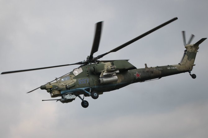 „AFP“/„Scanpix“/Rusijos karinis sraigtasparnis Mi-28