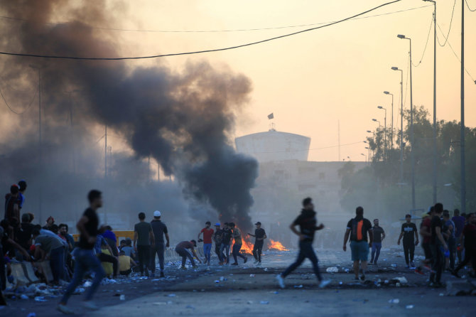 „Reuters“/„Scanpix“ nuotr./Protestai Bagdade