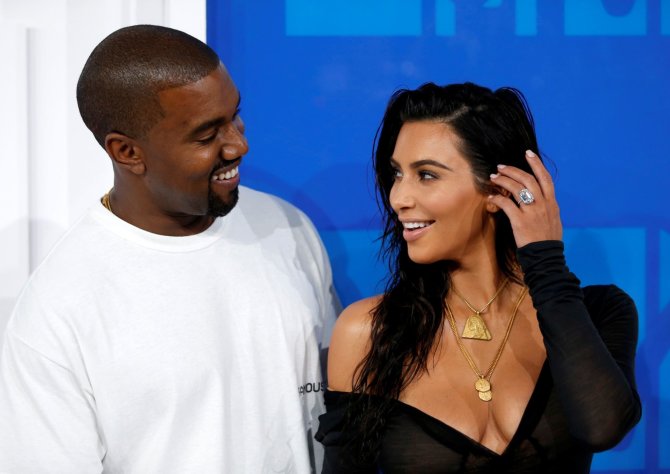 „Reuters“/„Scanpix“ nuotr./Kim Kardashian ir Kanye Westas 