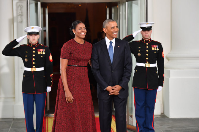 „Scanpix“/„Sipa USA“ nuotr./Michelle Obama ir Barackas Obama