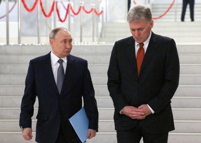 Vladimiras Putinas ir Dmitrijus Peskovas / GAVRIIL GRIGOROV / AFP