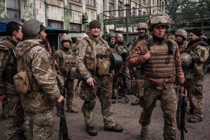 AFP/„Scanpix“ nuotr./Iš fronto grįžę Ukrainos kariai