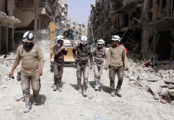 AFP/„Scanpix“ nuotr./„Baltieji šalmai“ Sirijoje