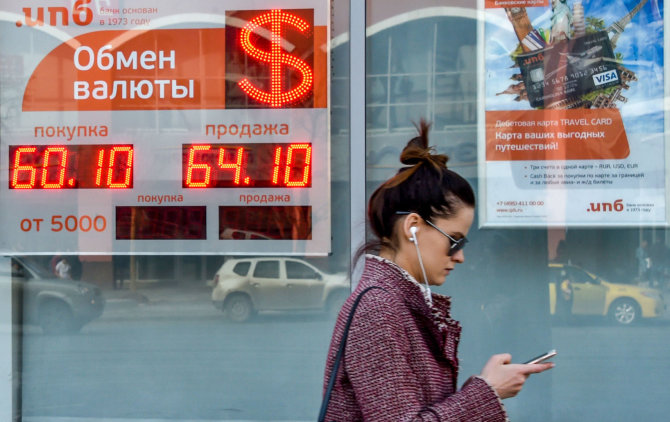 AFP/„Scanpix“ nuotr./JAV sankcijos kenkia Rusijos ekonomikai