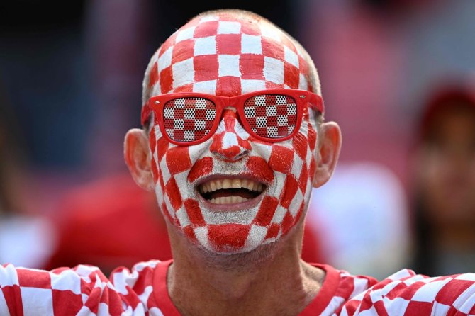 AFP/„Scanpix“ nuotr./Kroatų futbolo sirgalius Katare