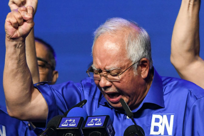 AFP/„Scanpix“ nuotr./ Najibas Razakas