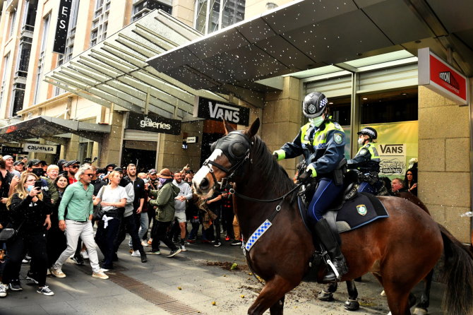 „Reuters“/„Scanpix“ nuotr./Protestas prieš koronaviruso ribojimus Australijoje