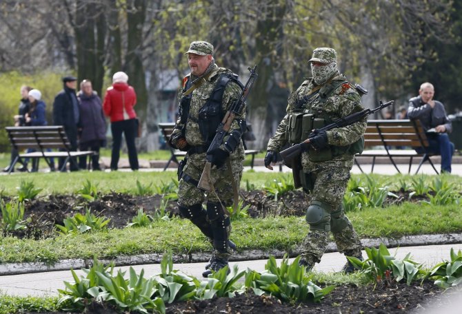 „Reuters“/„Scanpix“ nuotr./„Žalieji žmogeliukai“ Slaviansko mieste