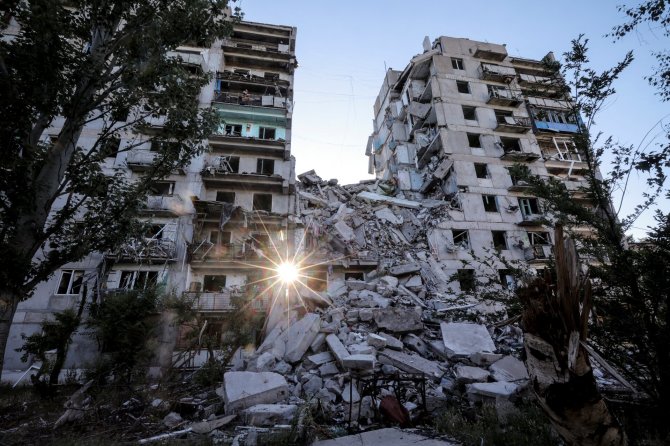 „Reuters“/„Scanpix“ nuotr./Rusijos karinės atakos stipriai nuniokojo Torecko gyvenamuosius pastatus