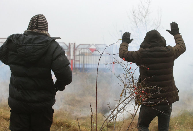 Tass/„Scanpix“ nuotr./Migrantai Lenkijos pasienyje