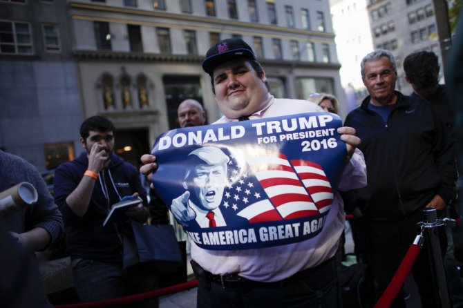 AFP/„Scanpix“ nuotr./Donaldo Trumpo kandidatūrą palaikantys amerikiečiai