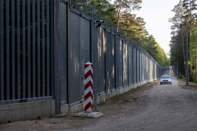 „AFP“/„Scanpix“/Lenkijos pasienis su Baltarusija