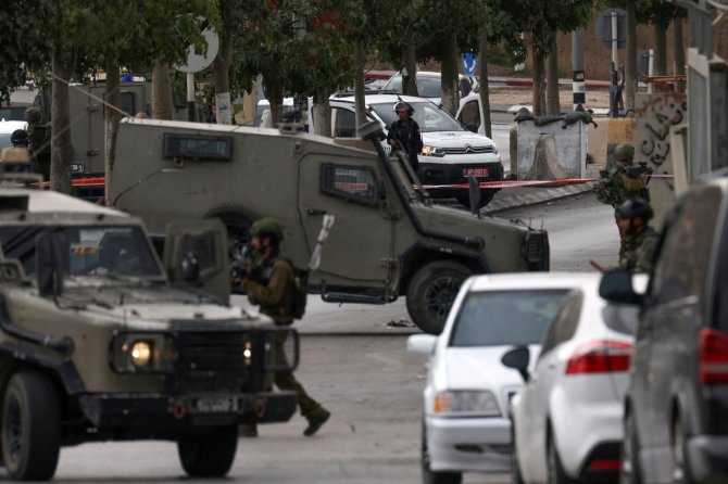 AFP/„Scanpix“ nuotr./Izraelis uždaro Vakarų Krantą