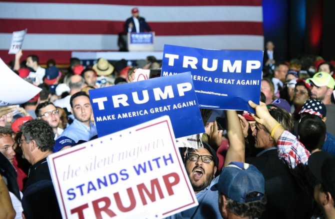 AFP/„Scanpix“ nuotr./Donaldo Trumpo rinkėjai