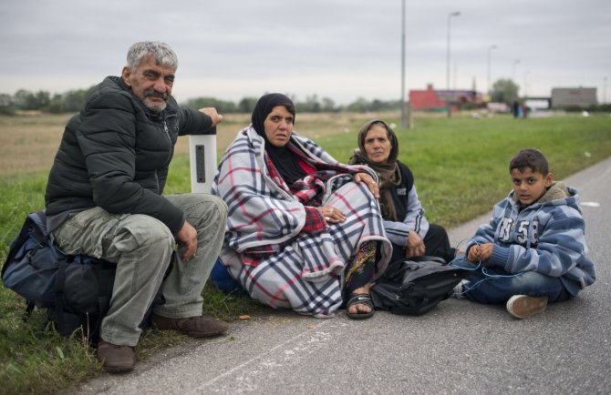 „Reuters“/„Scanpix“ nuotr./Pabėgėliai Vengrijoje