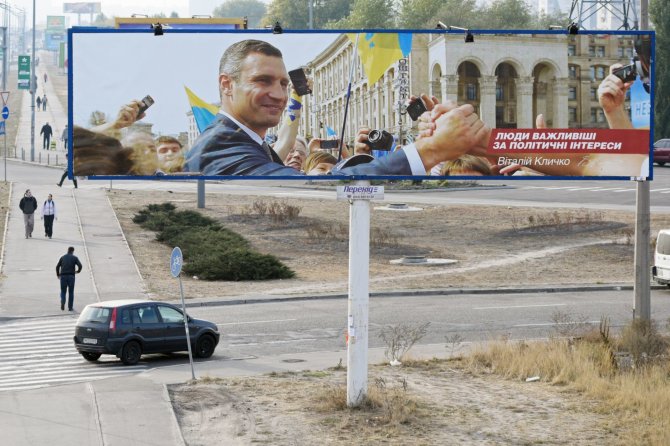 „Scanpix“/„RIA Novosti“ nuotr./Agitaciniai plakatai Ukrainoje