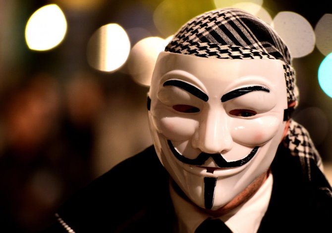 Scanpix nuotr./„Anonymous“ simbolis – Gajaus Fokso kaukė