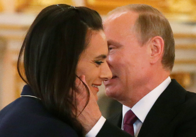 „Scanpix“ nuotr./Vladimiras Putinas ir Jelena Isinbajeva