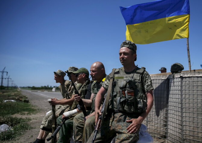„Reuters“/„Scanpix“ nuotr./Ukrainos kariai Marjinkoje