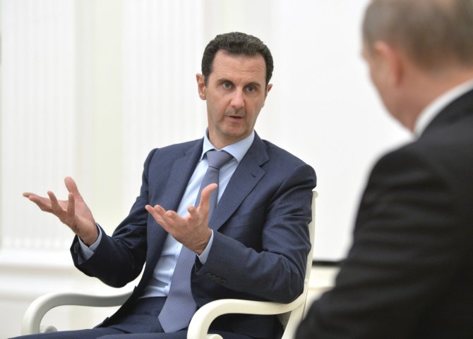 „Reuters“/„Scanpix“ nuotr./Sirijos prezidentas Basharas al Assadas susitinka su Vladimiru Putinu