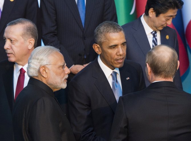 AFP/„Scanpix“ nuotr./Barackas Obama ir Vladimiras Putinas