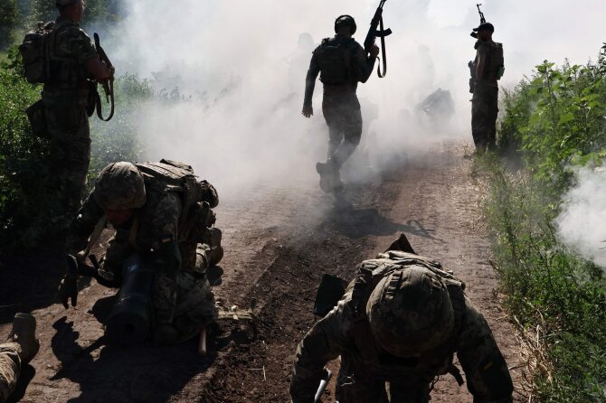 AFP/ „Scanpix“/Karas Ukrainoje