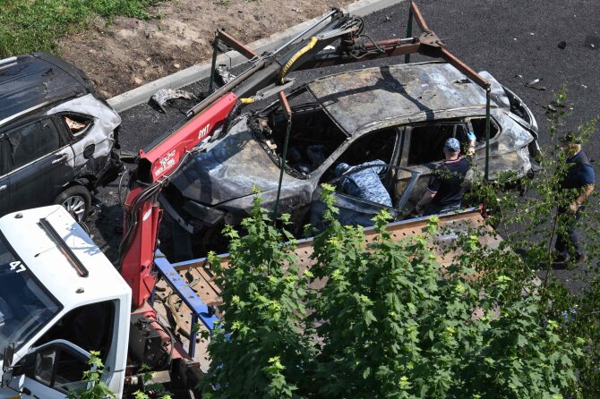 AFP/ „Scanpix“/Prie Maskvos susprogdintas automobilis