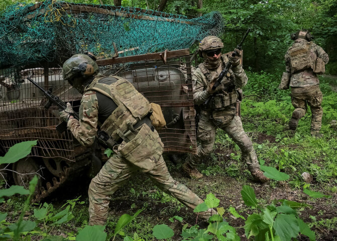 „Reuters“/„Scanpix“/Karas Ukrainoje / Asociatyvinė nuotr.