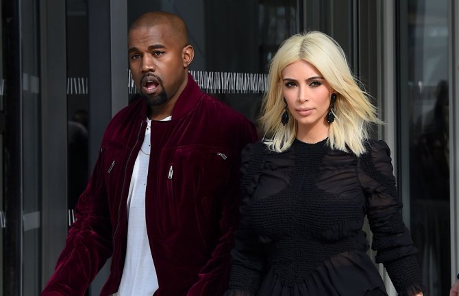 „Scanpix“/„SIPA“ nuotr./Kim Kardashian ir Kanye Westas