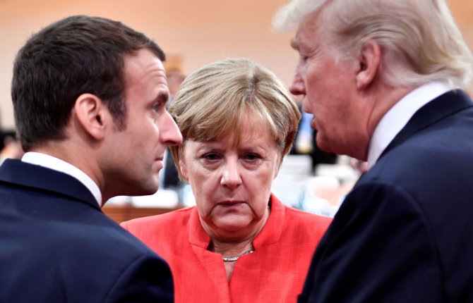 „Reuters“/„Scanpix“ nuotr./Emmanuelis Macronas, Angela Merkel ir Donaldas Trumpas