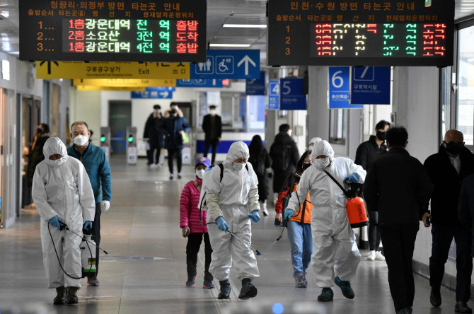 AFP/„Scanpix“ nuotr./Pietų Korėjoje sėkmingai kovojama su koronavirusu