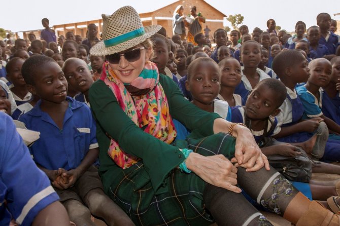 AFP/„Scanpix“ nuotr./Madonna Malavyje 2014 metais