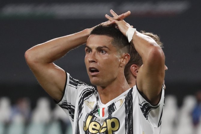 „Scanpix“ nuotr./Cristiano Ronaldo ir Turino „Juventus“ žygį Čempionų lygoje sustabdė Liono „Olympique“.