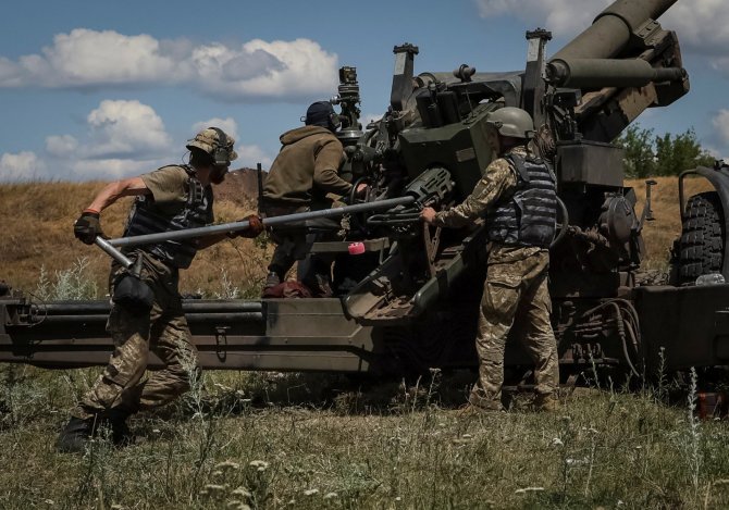 „Reuters“/„Scanpix“ nuotr./Ukrainos kariai netoli fronto linijos