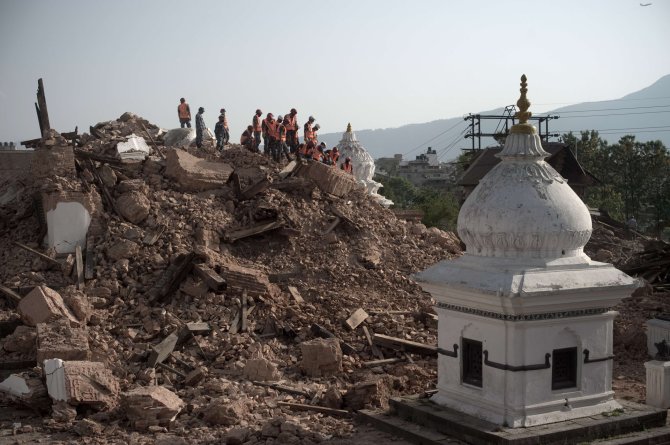 AFP/„Scanpix“ nuotr./Nepalas po žemės drebėjimo