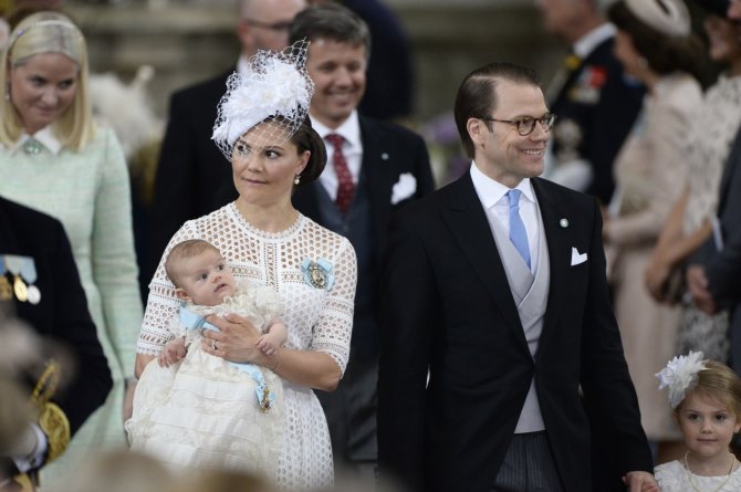 „Scanpix“ nuotr./Švedijos princesė Victoria ir princas Danielis su sūnumi Oscaru