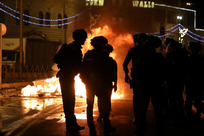 „Reuters“/„Scanpix“ nuotr./Izraelio kariai Rytų Jeruzalėje
